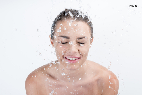 portrait of smiling woman taking shower-img-blog